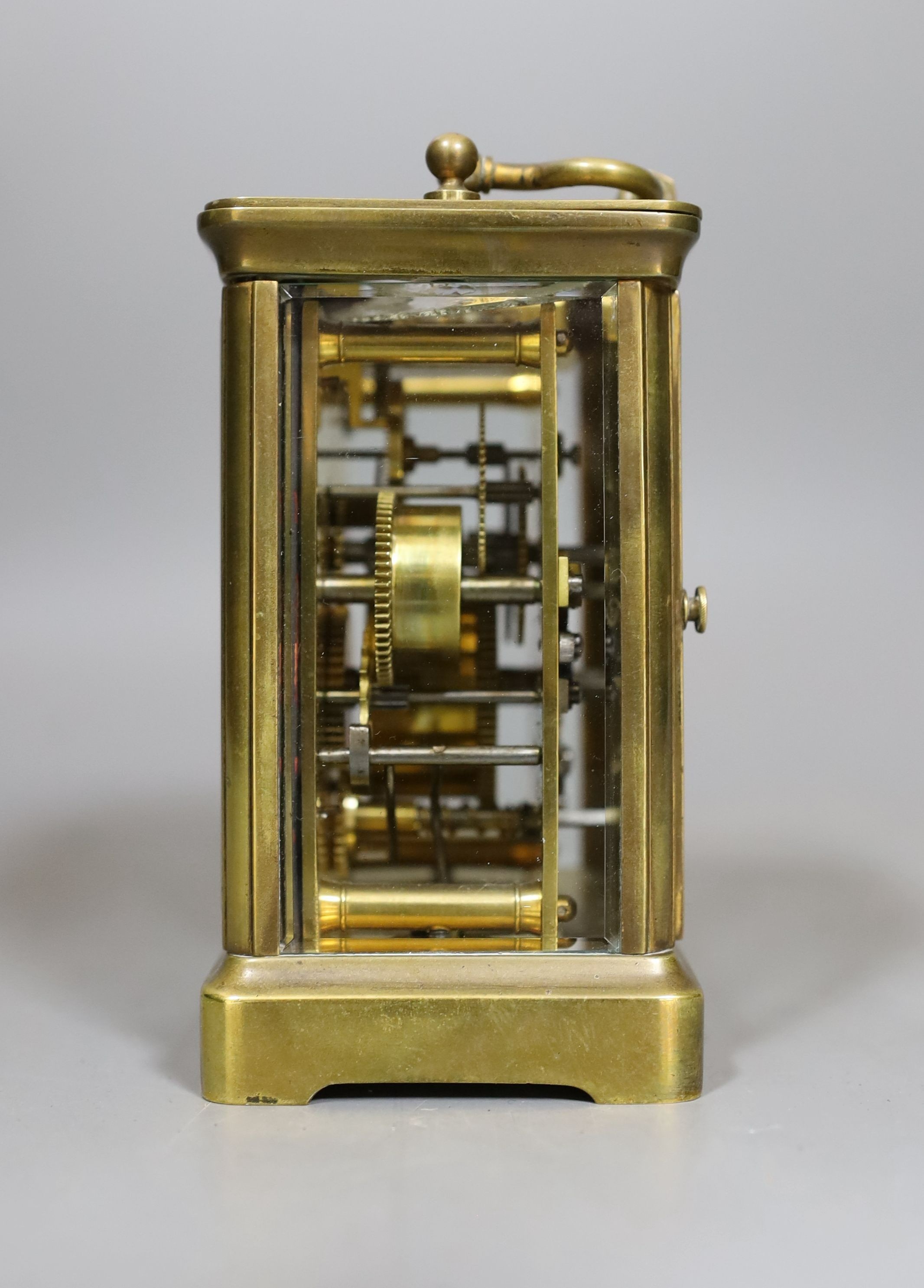 A carriage clock with alarm, 10.5 cms high.